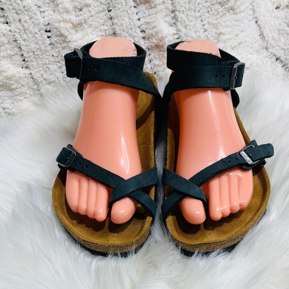 Birkenstock Black Sandals with Adjustable Straps and Contoured Footbed